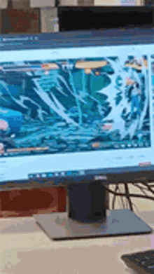a computer monitor is displaying a video game on it