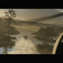 a helicopter is flying over a body of water