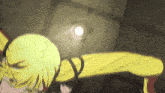 a girl with yellow hair is dancing in front of a spotlight