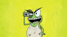 a cartoon frog is holding a camera to his eye .