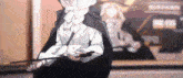 a cartoon girl is holding a sword in her hands while standing in a room .