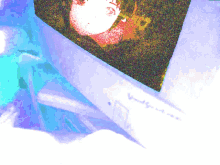 a painting of a woman 's face is displayed on a computer monitor