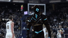 a basketball player wearing a number 11 jersey stands in front of a robot