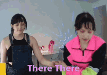 two girls holding hands with the words " there there " written on the bottom