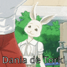 a cartoon of a white rabbit with the name dania de torki on the bottom