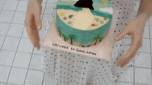 a woman is holding a piece of cake in her hands and eating it .