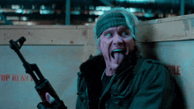 making a silly face gunner jensen the expendables 4 tongue out making a funny face