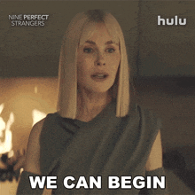 a woman says we can begin in front of a hulu logo