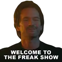 a picture of a man with the words welcome to the freak show on it