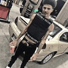a young man wearing a black vest that says all star