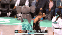 a basketball game is being played between connecticut and new york and the score is 28 to 74