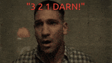 a man in a plaid shirt says " 3 2 1 darn ! "