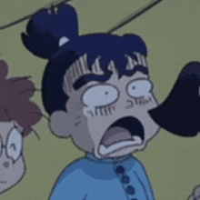 a close up of a cartoon character making a funny face with his mouth open .