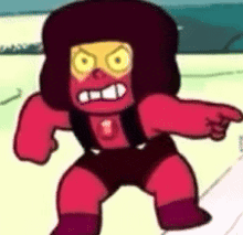 a cartoon character with a red face and yellow eyes is pointing at the camera .