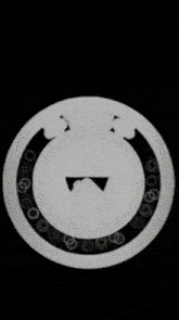 a black and white image of a circle with a face in the center