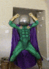 a person in a superhero costume with a purple cape