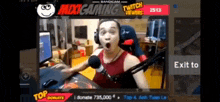 a man wearing headphones and a red tank top is playing a video game .