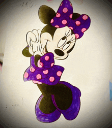 a drawing of minnie mouse wearing a purple and pink bow
