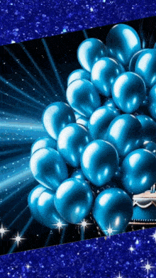 a bunch of blue balloons against a blue background