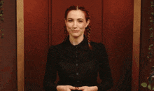 a woman says " not that one " in front of a door