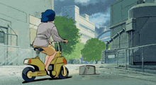 a person riding a yellow scooter with a license plate that says dc