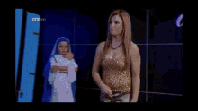 a man is performing a trick on a television show with one hd written on the bottom