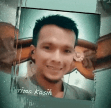 a picture of a man with the words terima kasih on the bottom right