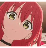 a close up of an anime girl with red hair