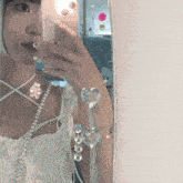 a woman is taking a selfie with her phone