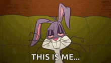 bugs bunny is laying on a green couch with his eyes closed and the words `` this is me '' .