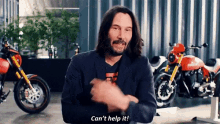 keanu reeves cant help it shrugs