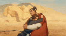 a man and a woman are hugging in the desert