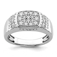 a white gold ring with a cluster of diamonds