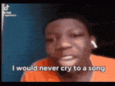 a young man is crying while wearing ear buds and says `` i would never cry to a song '' .