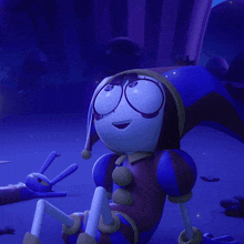 a cartoon character in a blue and purple outfit is sitting on the ground