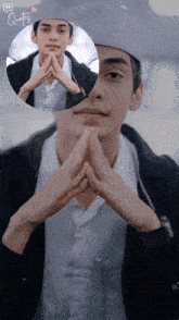 a young man with his hands folded in front of his face and a quote on the bottom right
