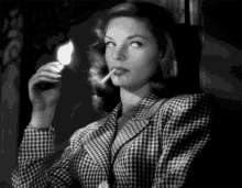 Lauren Bacall Smoking GIF - Lauren Bacall Smoking Cigarette GIFs