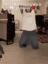 a man is jumping in the air with the words this gpo trading life is getting serious above him