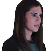 a close up of a woman 's face with a serious look on her face