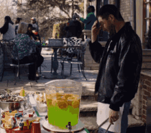 The Bear Tv Show Standing At The Punch Bowl GIF - The Bear Tv Show Standing At The Punch Bowl House Party With Food GIFs