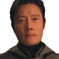 a close up of a man 's face with his eyes closed