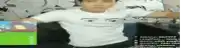 a man in a white t-shirt with a face on it