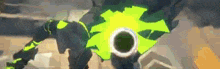 a close up of a green and black robot with a hole in it 's chest .