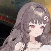 a close up of a girl 's face with a skull on her head