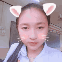 a girl wearing cat ears on her head