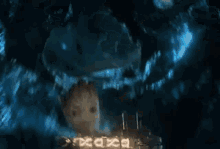 a close up of a person 's face in a dark room