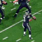 a football player wearing a jersey with the number 3 on it
