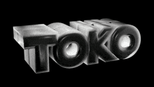 a 3d rendering of the word toko against a black background