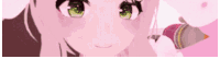 a close up of a girl 's face with green eyes holding a fork .