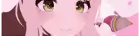 a close up of a girl 's face with green eyes holding a fork .